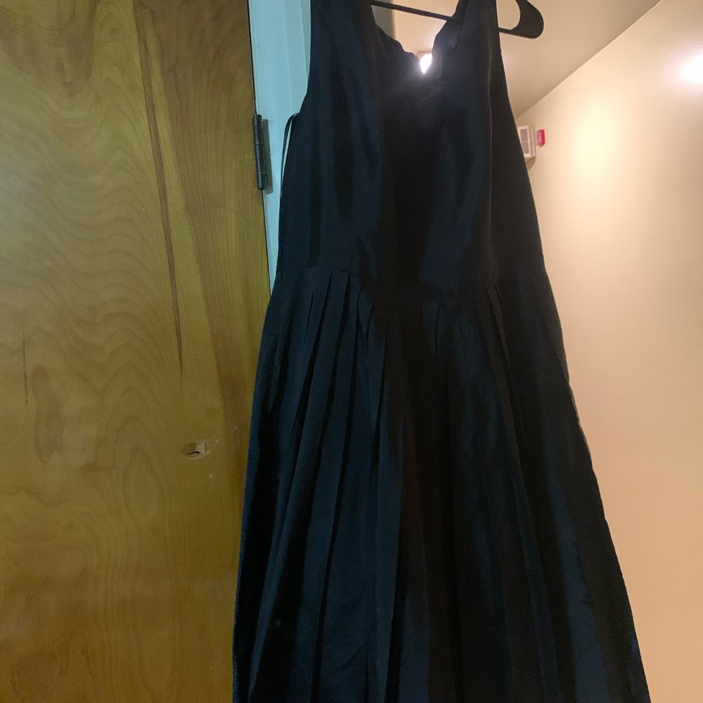 Mid length short black satin dress